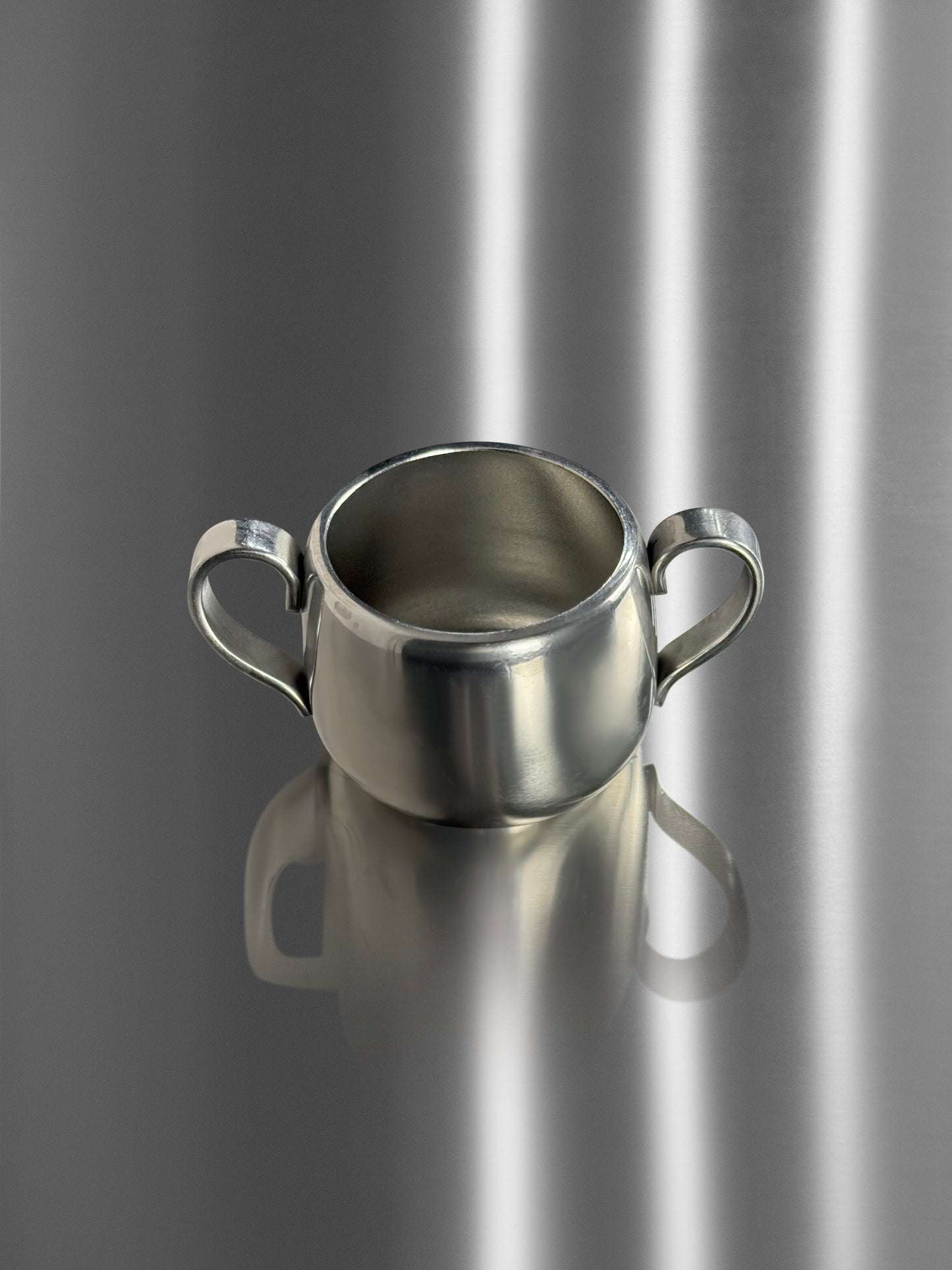 Two-handled coffee cup