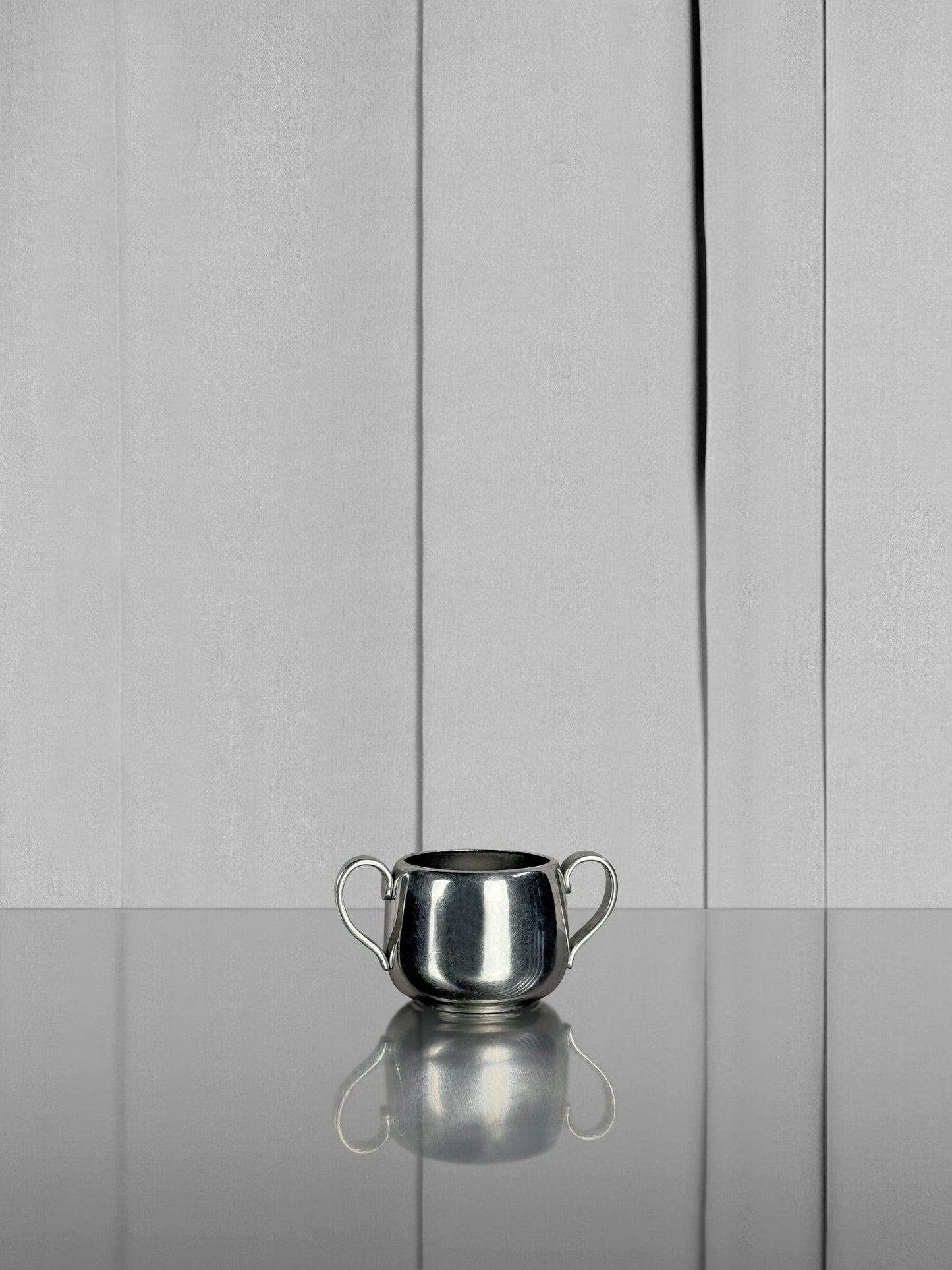 Two-handled coffee cup