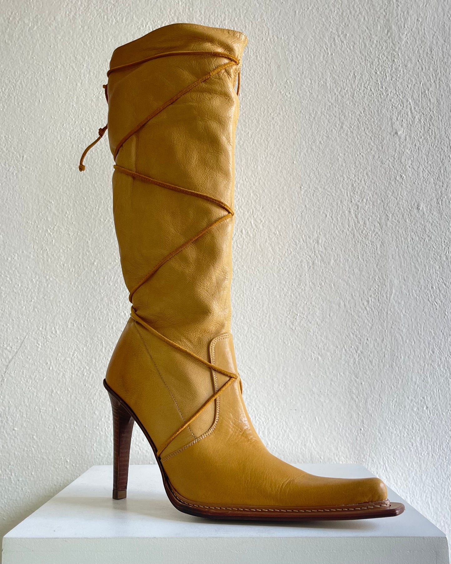 Yellow leather boots with laces