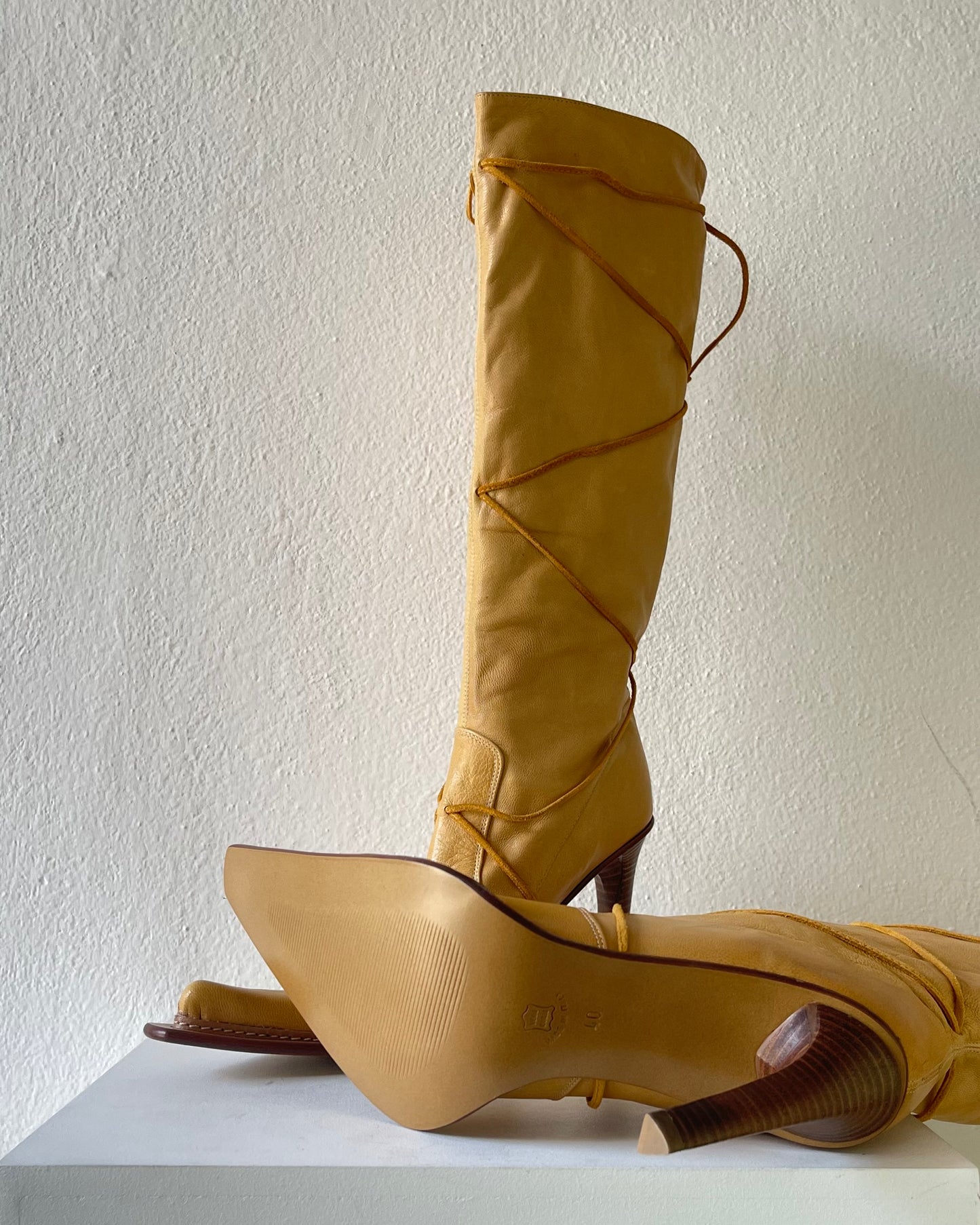 Yellow leather boots with laces