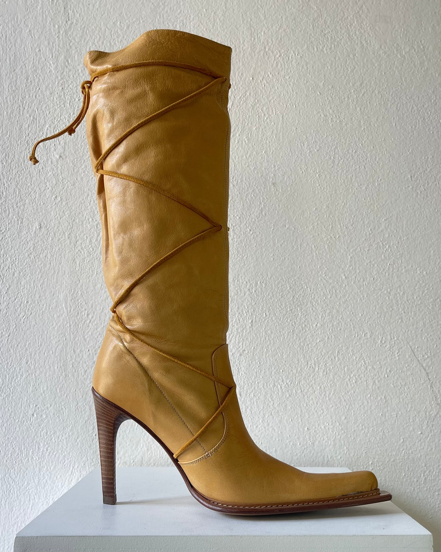 Yellow leather boots with laces