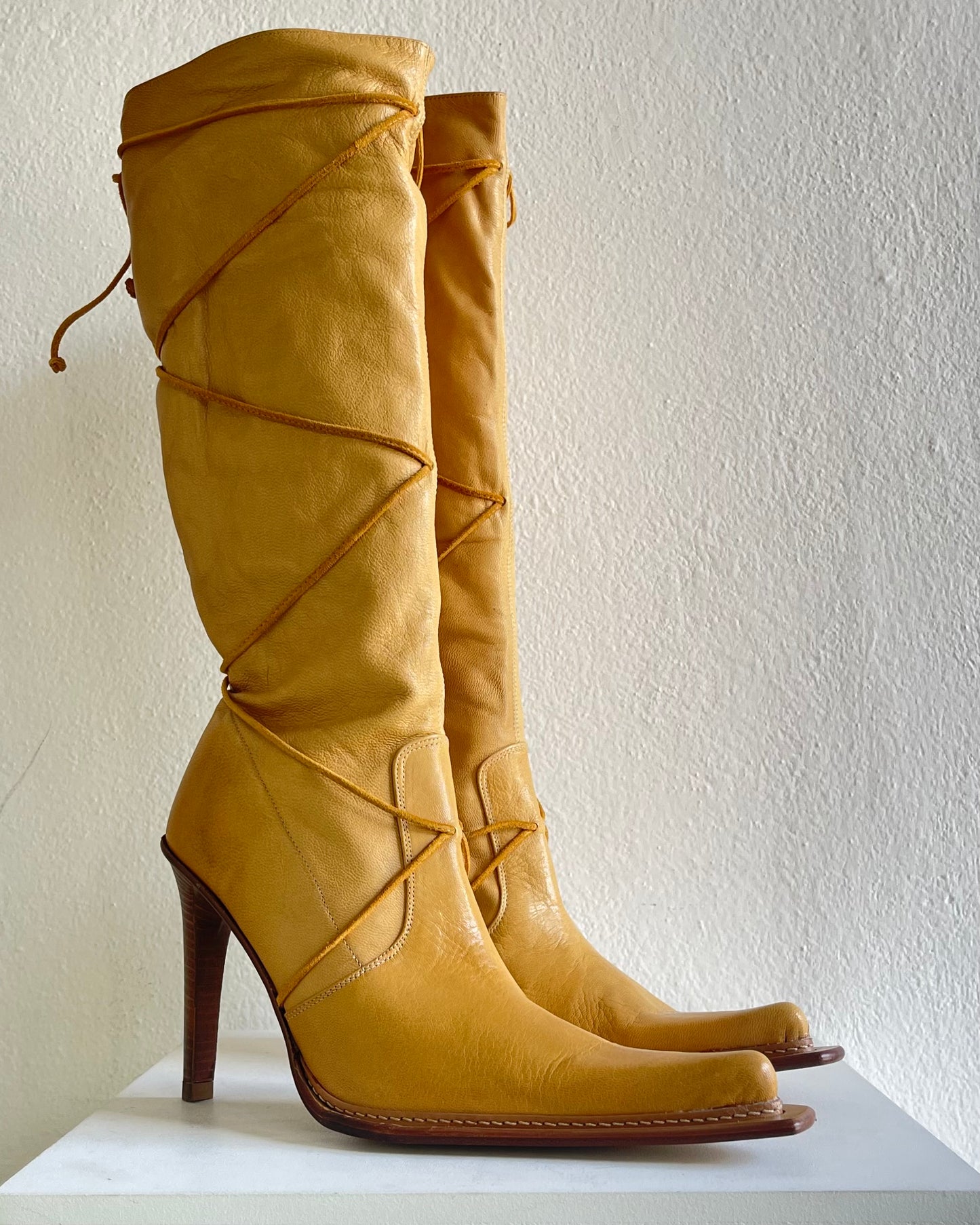 Yellow leather boots with laces