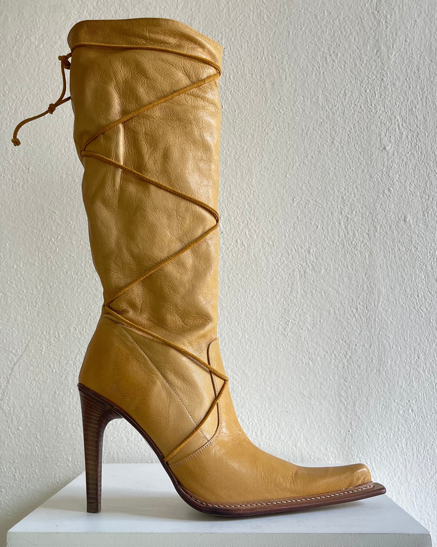 Yellow leather boots with laces